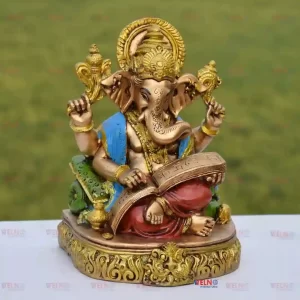 Ganesha Reading Ramayana Statue