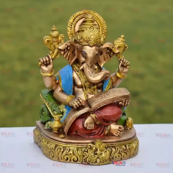 Ganesha Reading Ramayana Statue